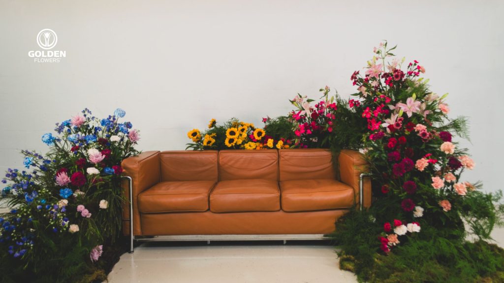 Floral set design with sofa used to film Golden Flowers’ Valentine’s Day “Dare to Love” campaign featuring people sharing different perspectives on love
